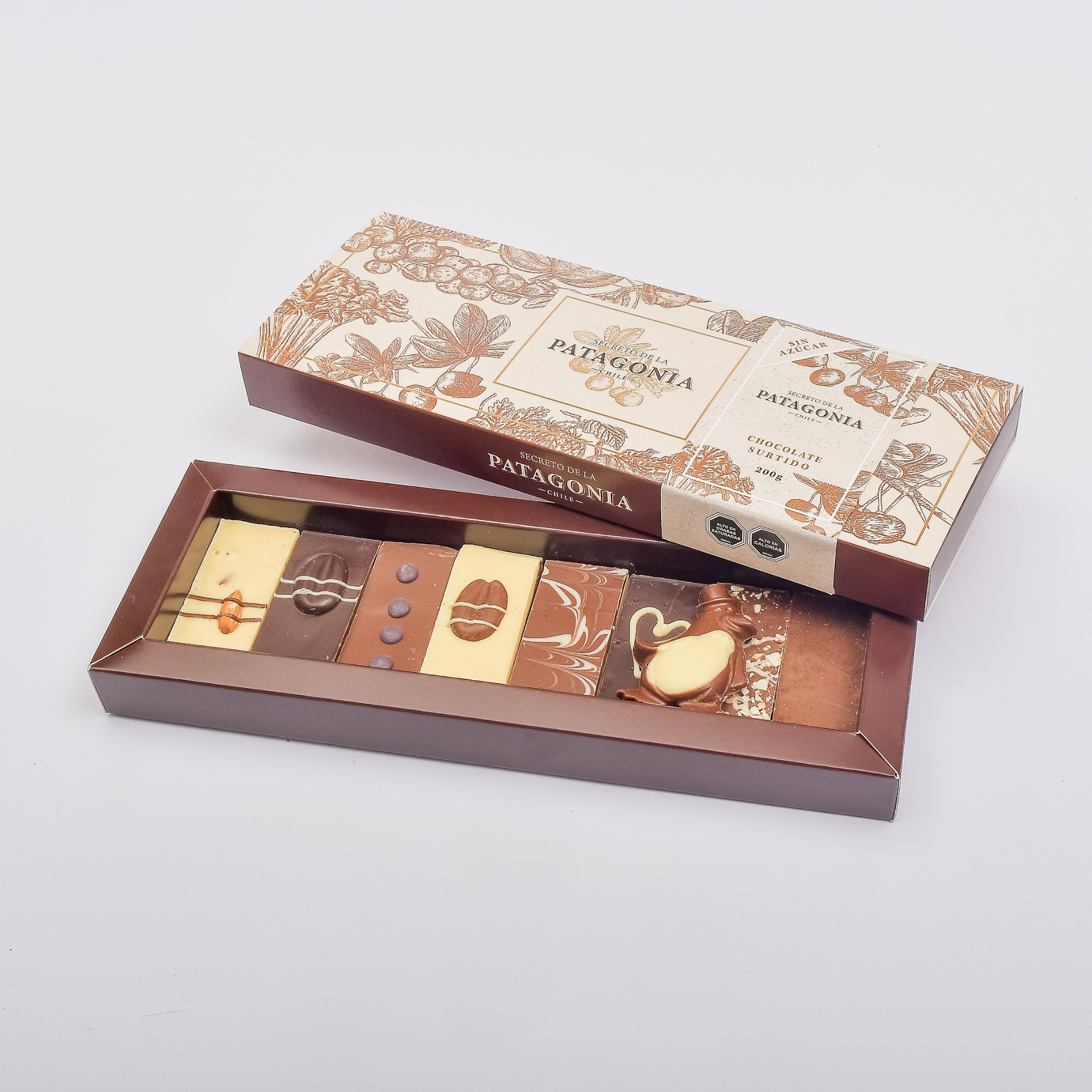 Caja Clásica Gourmet Sin Azúcar – 8 Barras + 1 Figura Patagónica